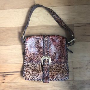The Find Vintage brown leather bag.